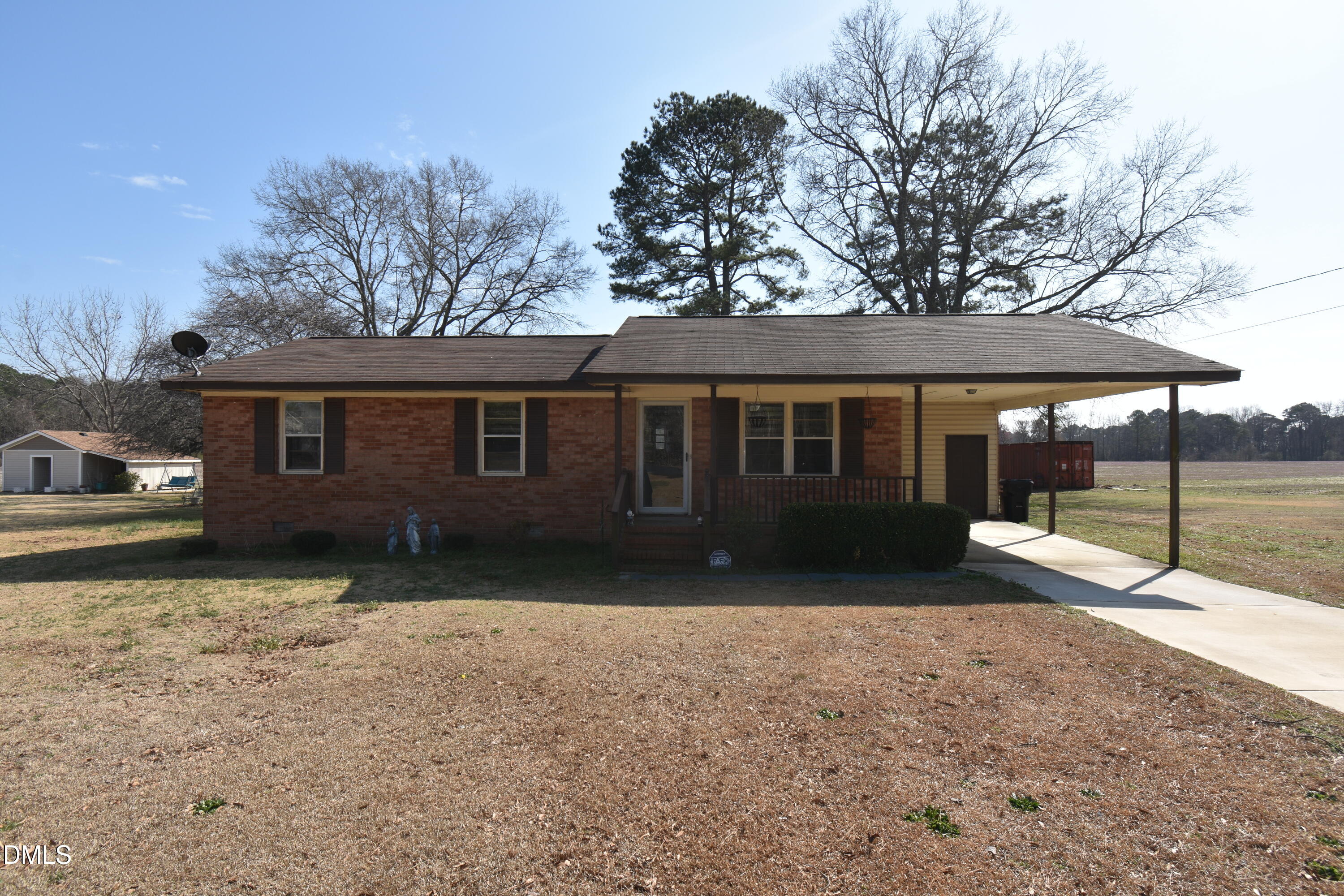 216 Sullivan Road Selma, NC 27576 - Photo 3 of 24 a view of a house with a yard