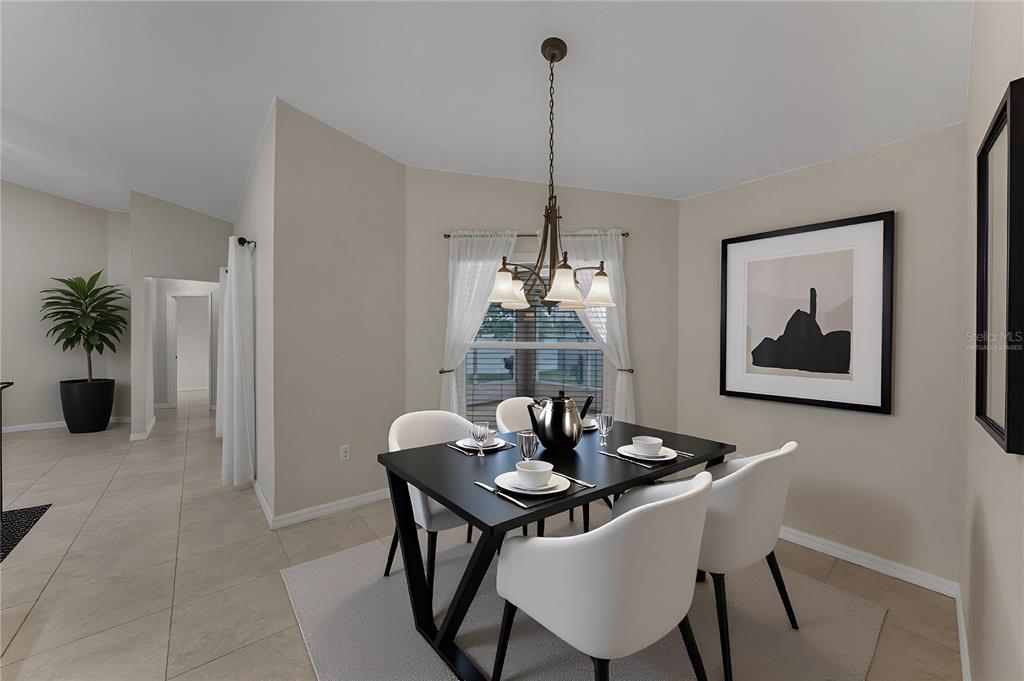 315 Cloverdale Road Winter Haven, FL 33884 - Photo 25 of 65 a dining room with furniture and window