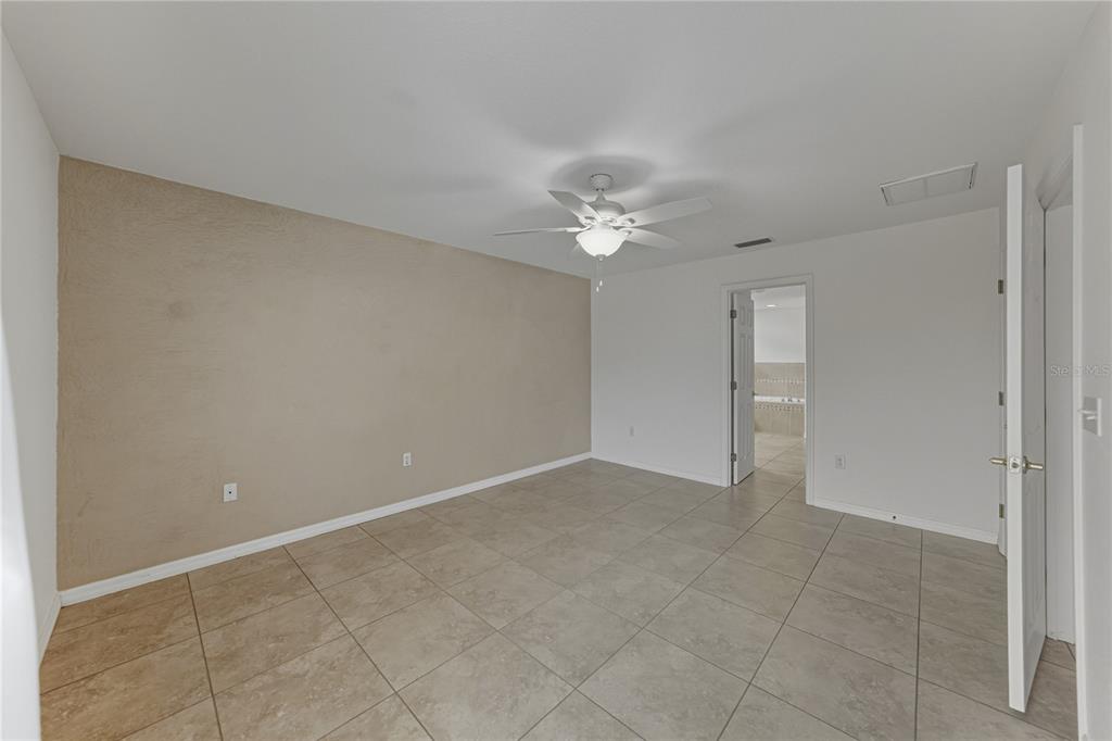 315 Cloverdale Road Winter Haven, FL 33884 - Photo 38 of 65 wooden floor in an empty room