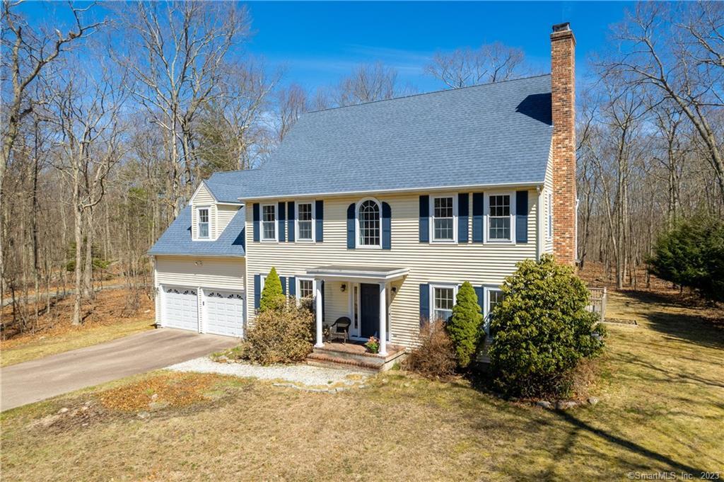 49 Stone Ridge Lane Mansfield, CT 06250 - Photo 1 of 1 front view of a house with a yard