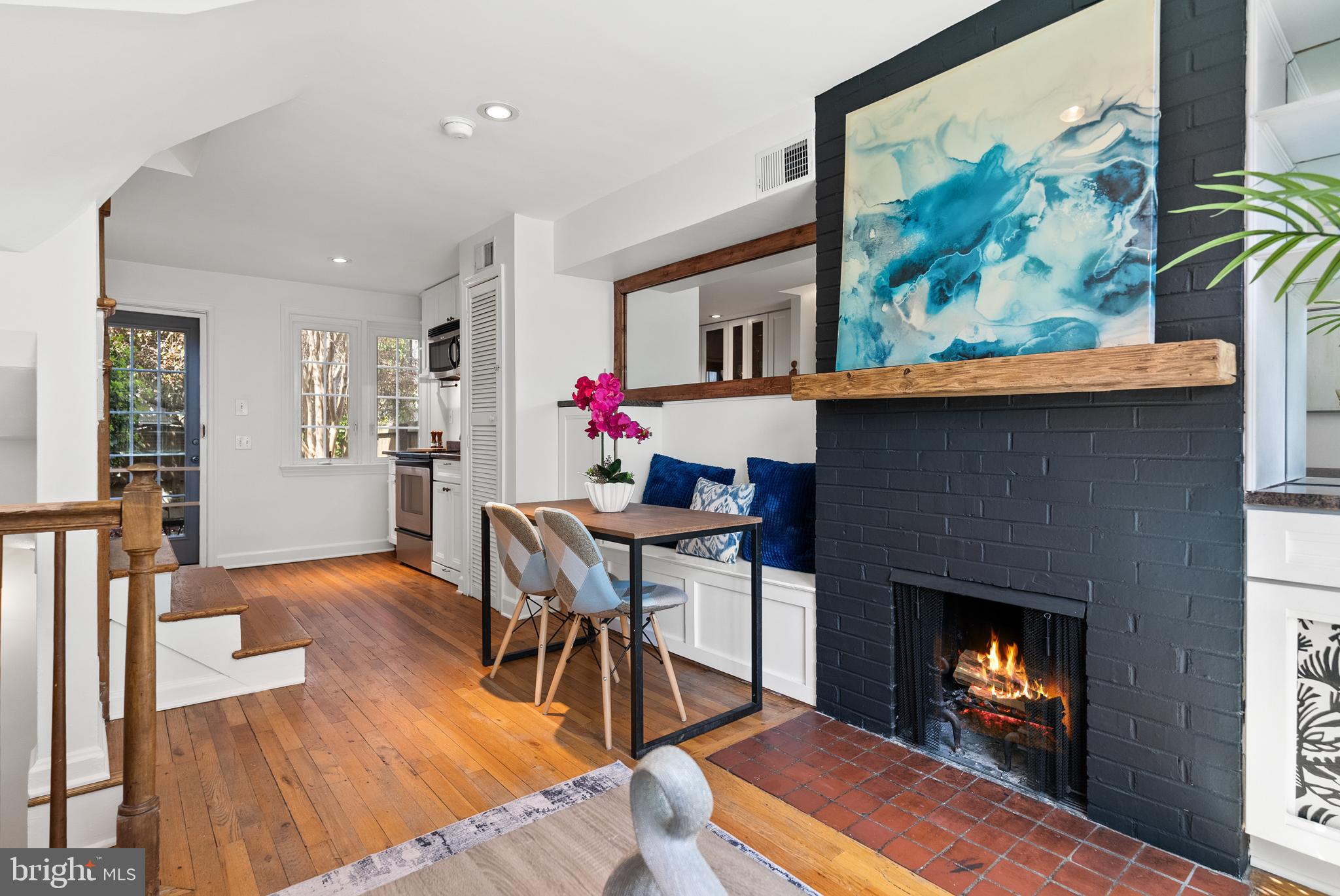 3219 Cherry Hill Lane Washington, DC 20007 - Photo 14 of 32 a living room with furniture and a fireplace