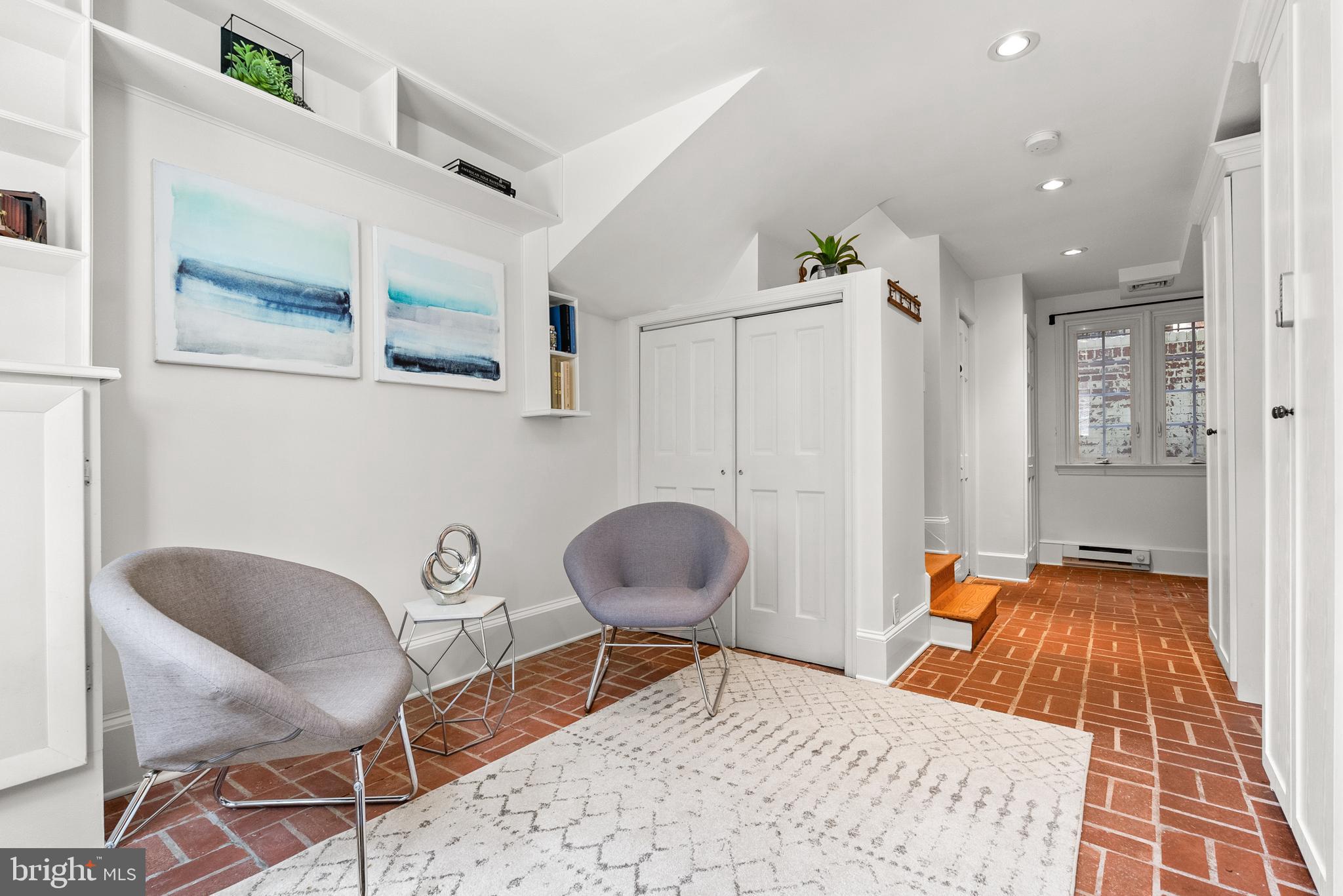 3219 Cherry Hill Lane Washington, DC 20007 - Photo 7 of 32 a room with a chair and a rug