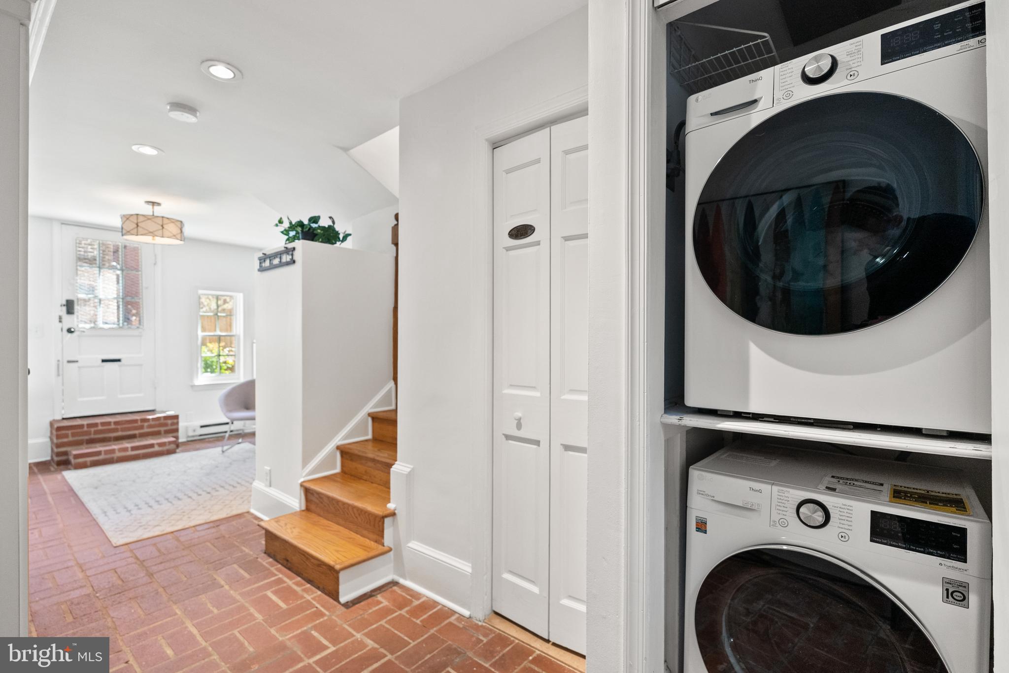 3219 Cherry Hill Lane Washington, DC 20007 - Photo 10 of 32 a view of a hallway with washer and dryer
