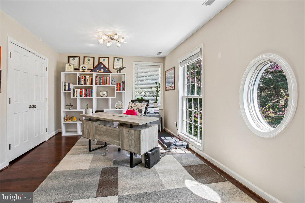 1305 Key Drive Alexandria, VA 22302 - Photo 27 of 64 a work room with furniture and a book shelf
