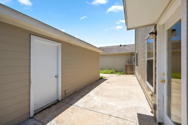 a view of a back yard with porch