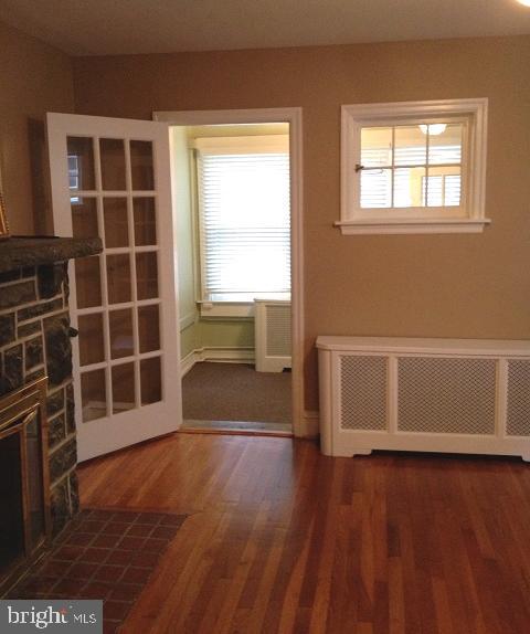 2428 East County Line Road Ardmore, PA 19003 - Photo 10 of 26 living room/view to front sun room