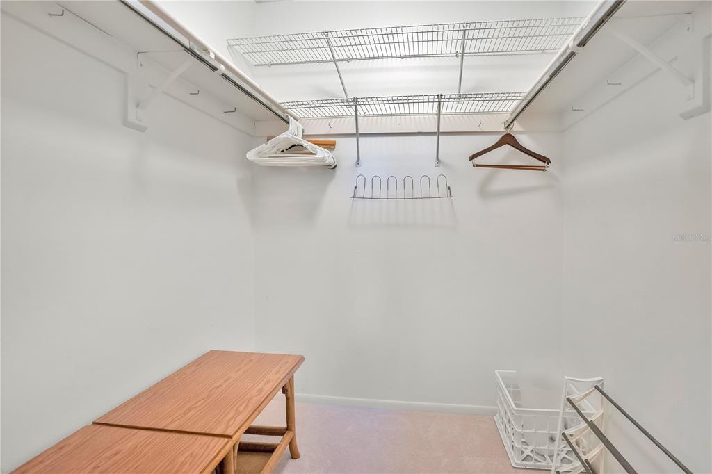 1646 Stickney Point Road, Unit 1646101 Sarasota, FL 34231 - Photo 22 of 67 a view of a room with racks on the wall