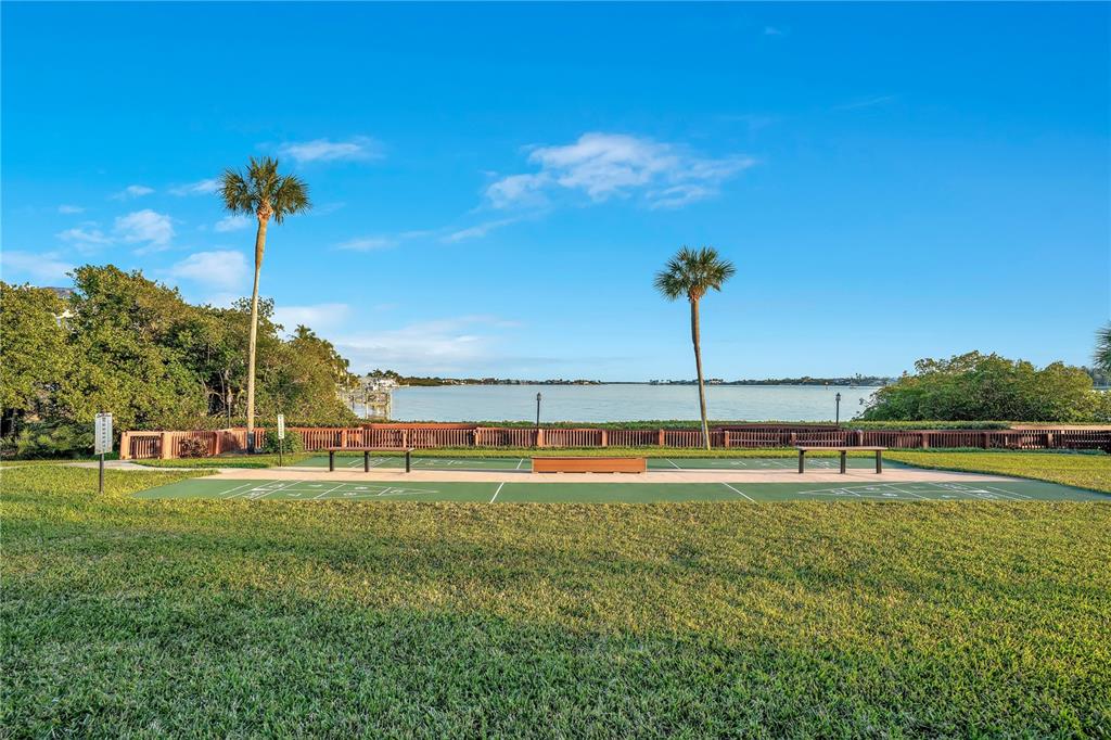 1646 Stickney Point Road, Unit 1646101 Sarasota, FL 34231 - Photo 43 of 67 a view of a house with a swimming pool