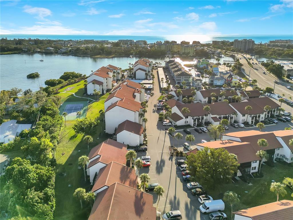 1646 Stickney Point Road, Unit 1646101 Sarasota, FL 34231 - Photo 45 of 67 an aerial view of residential houses with outdoor space