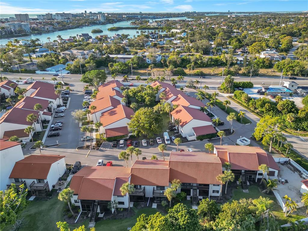 1646 Stickney Point Road, Unit 1646101 Sarasota, FL 34231 - Photo 47 of 67 an aerial view of residential houses with outdoor space