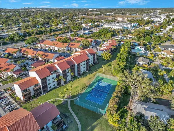 an aerial view of a house with a garden