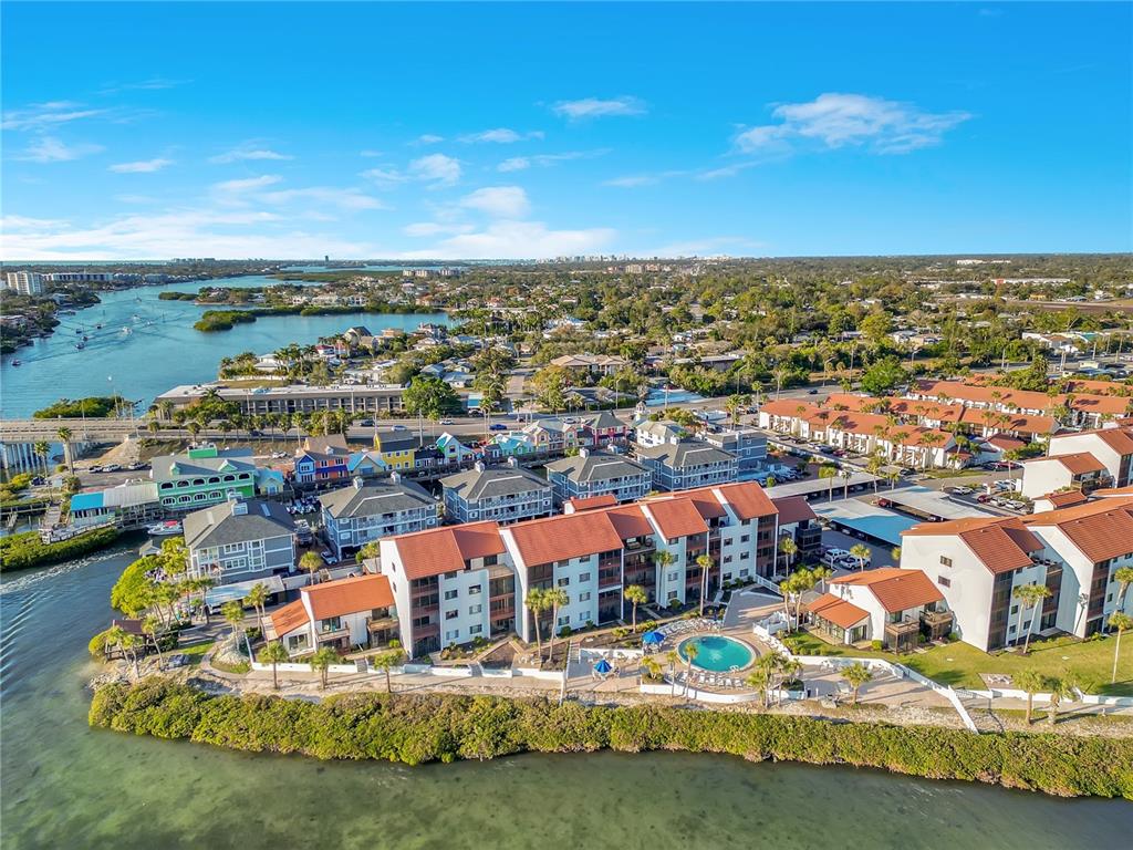 1646 Stickney Point Road, Unit 1646101 Sarasota, FL 34231 - Photo 52 of 67 an aerial view of residential houses with outdoor space