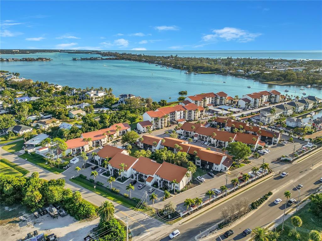 1646 Stickney Point Road, Unit 1646101 Sarasota, FL 34231 - Photo 62 of 67 a view of a city and an ocean view