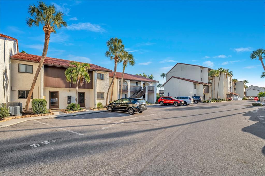 1646 Stickney Point Road, Unit 1646101 Sarasota, FL 34231 - Photo 63 of 67 a view of a street with cars