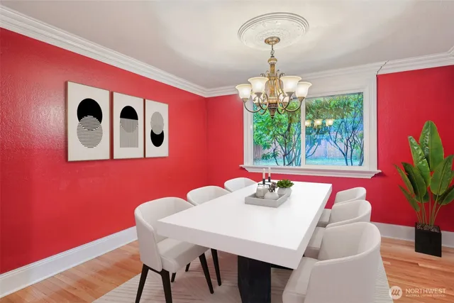 a dining room with furniture and window