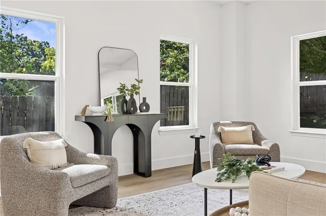 a living room with furniture and a window