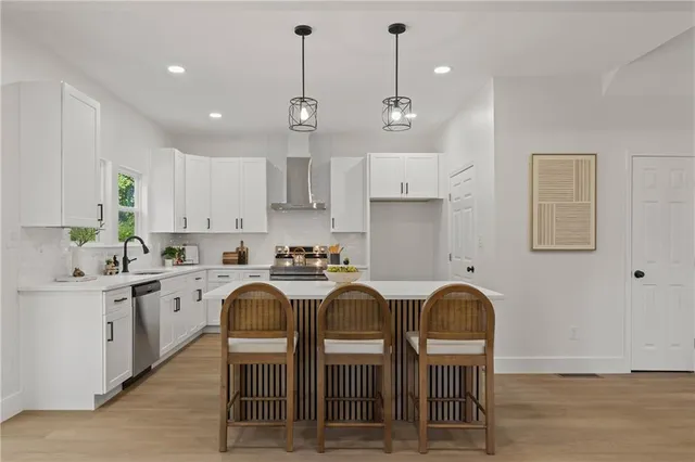 a view of kitchen with breakfast area