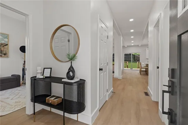 a view of a hallway with workspace