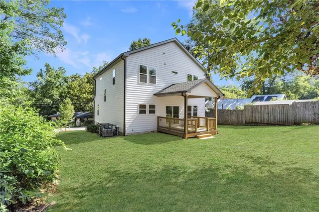 a view of a backyard with a garden and plants