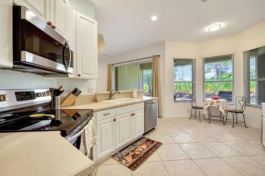 7024 Southeast Cricket Court Stuart, FL 34997 - Photo 6 of 46 IMG_9210