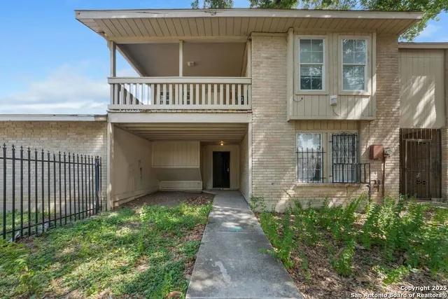 a front view of a house with a porch