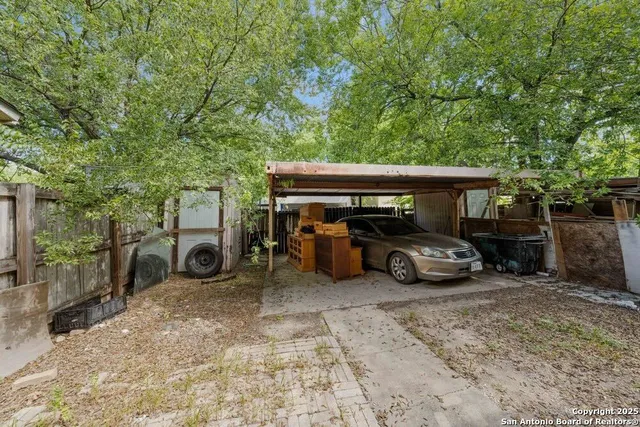 a view of street with parked cars