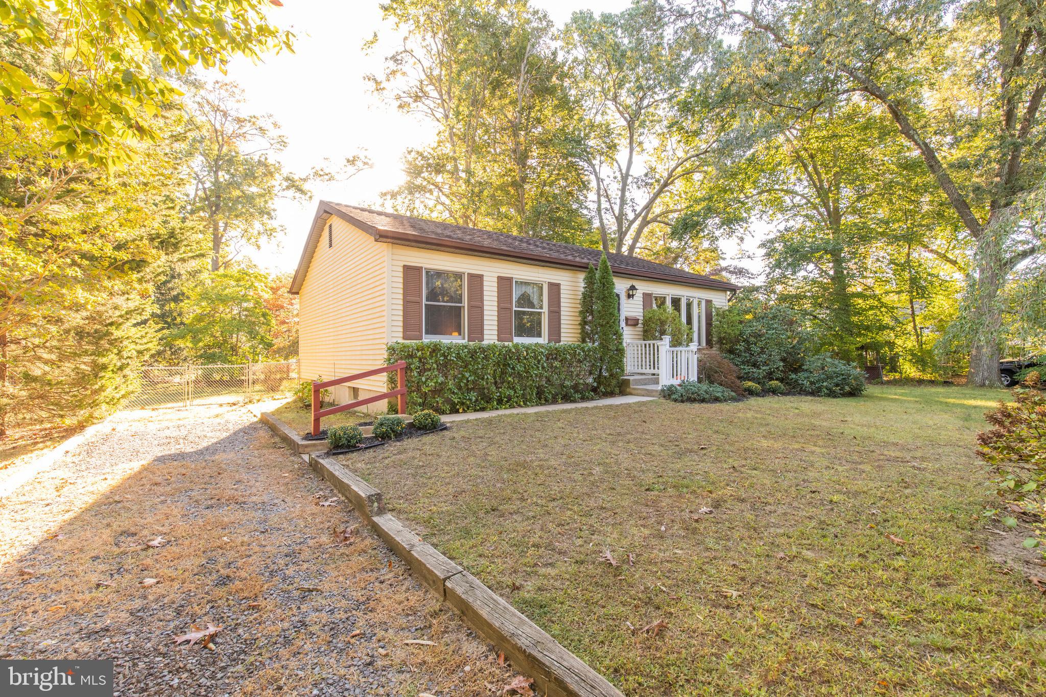 5 Edison Avenue Clementon, NJ 08021 - Photo 2 of 28 a house with trees in front of it