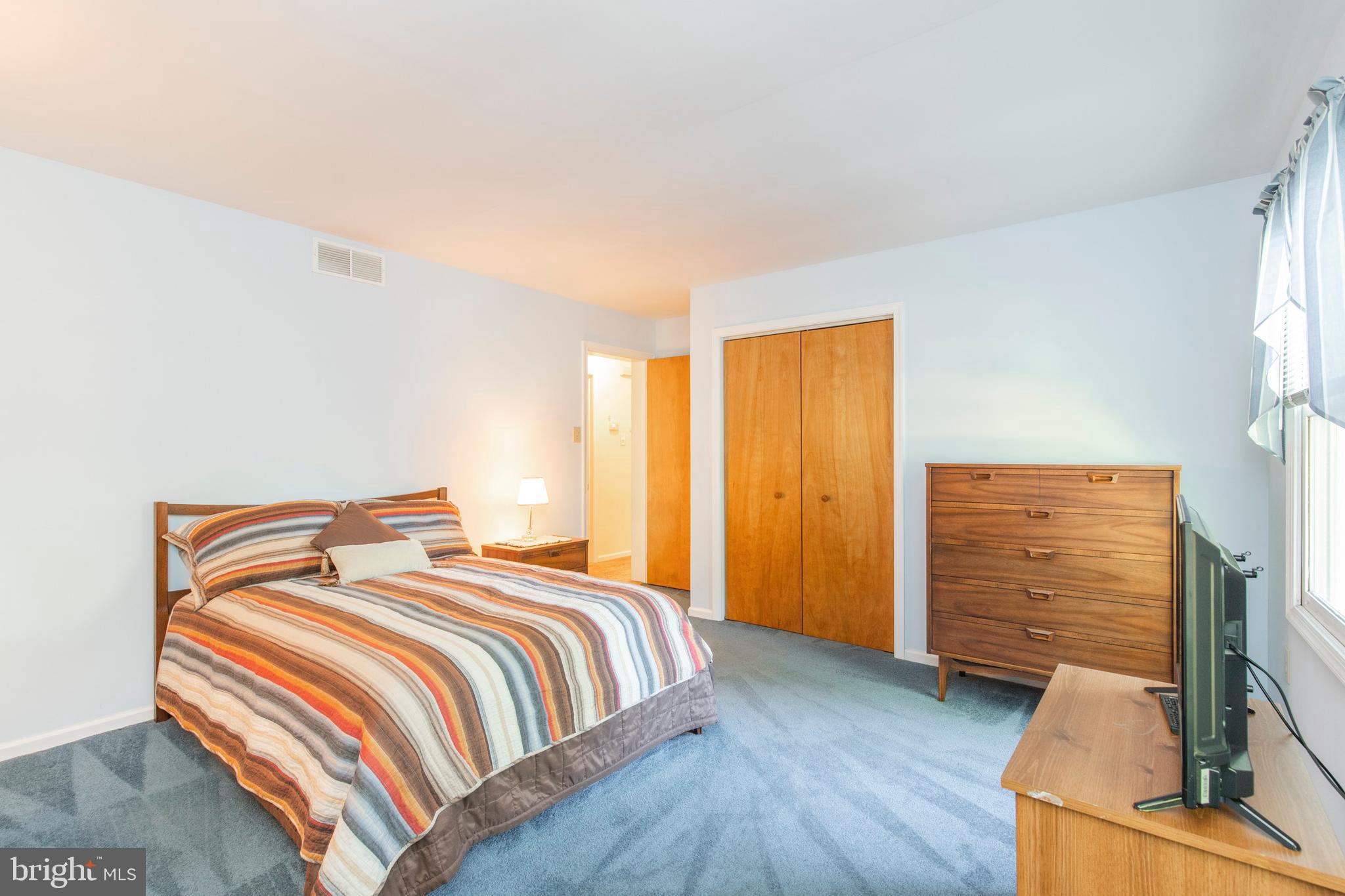 5 Edison Avenue Clementon, NJ 08021 - Photo 12 of 28 a bedroom with a bed and wooden floor