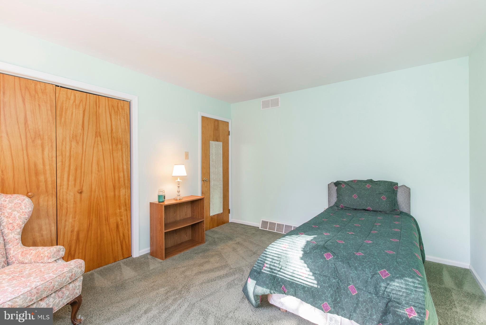 5 Edison Avenue Clementon, NJ 08021 - Photo 13 of 28 a bedroom with a bed and a table in it