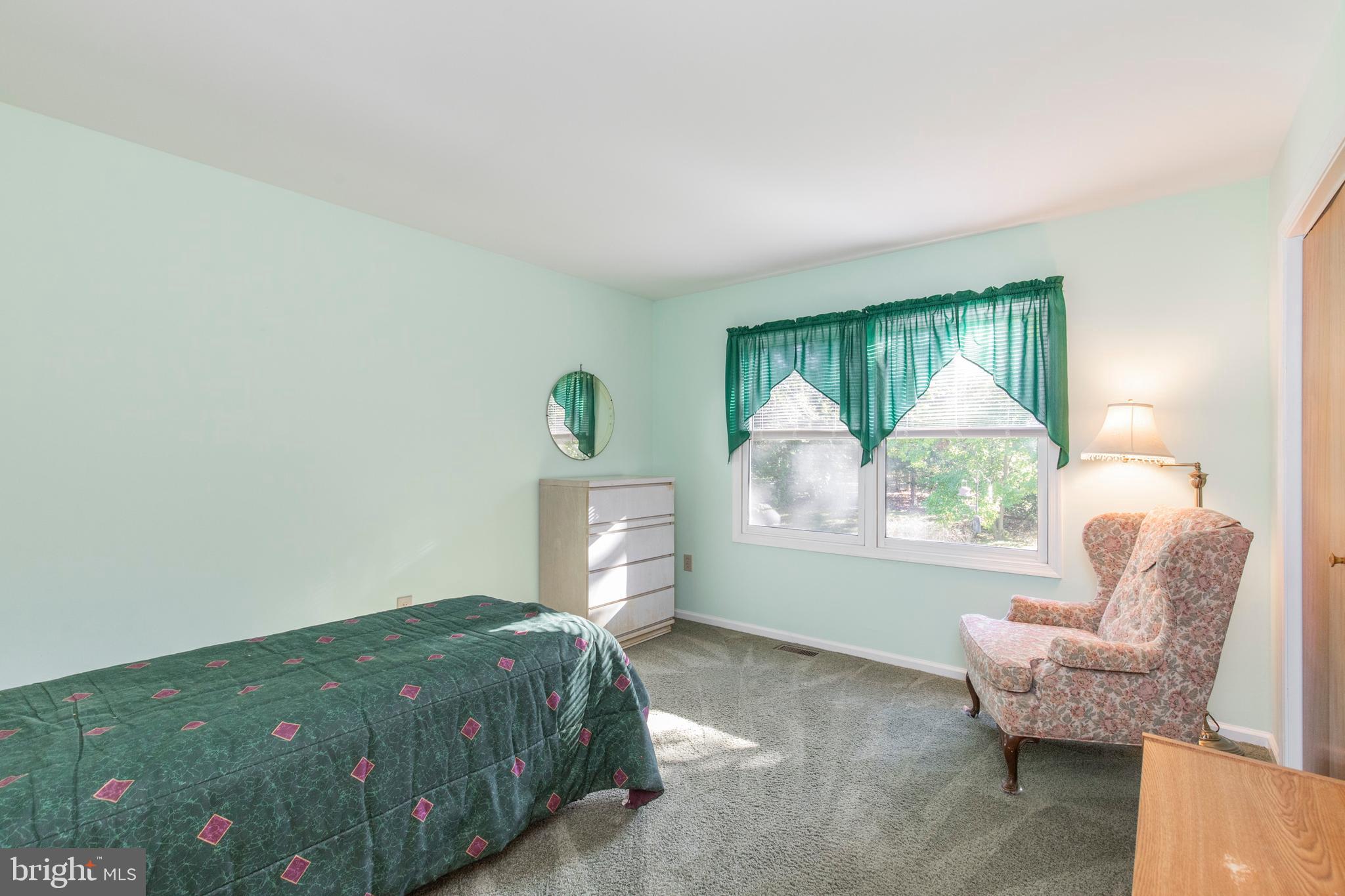 5 Edison Avenue Clementon, NJ 08021 - Photo 15 of 28 a bedroom with a bed and a chair