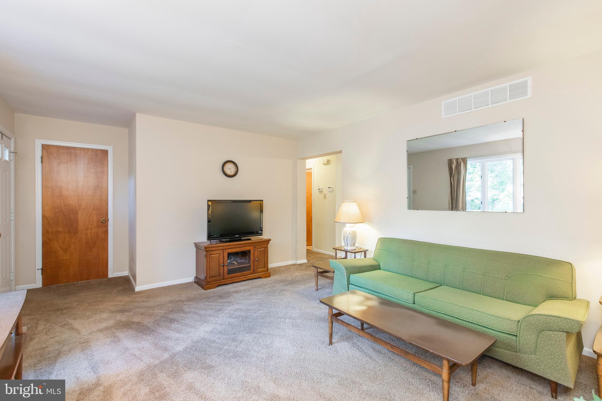 5 Edison Avenue Clementon, NJ 08021 - Photo 6 of 28 a living room with furniture and a flat screen tv
