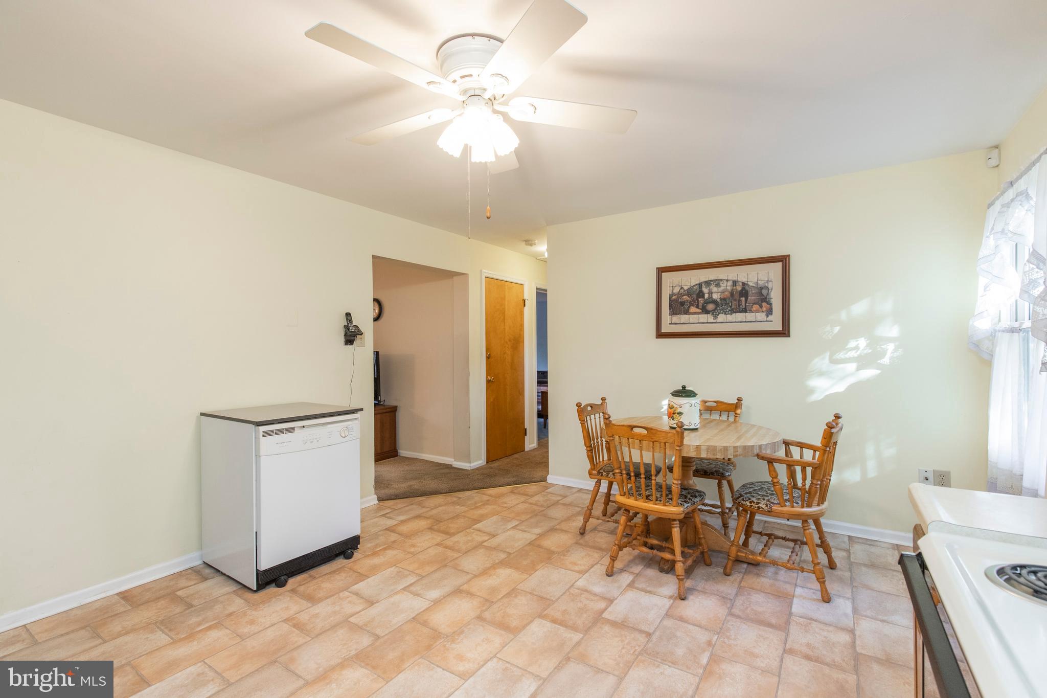 5 Edison Avenue Clementon, NJ 08021 - Photo 8 of 28 a dining room with furniture and a chandelier fan