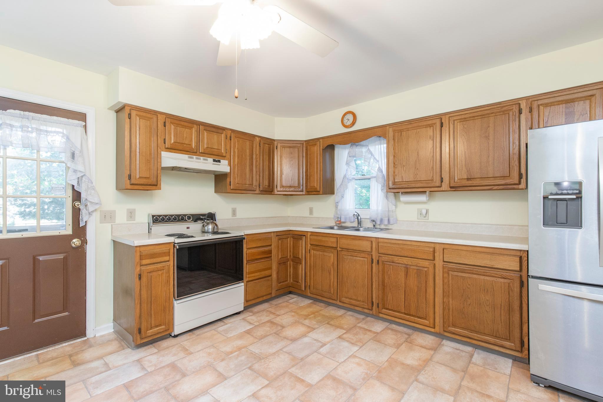 5 Edison Avenue Clementon, NJ 08021 - Photo 9 of 28 a kitchen with stainless steel appliances granite countertop a stove sink and cabinets