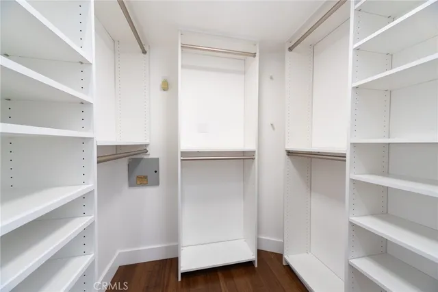 a view of an empty walk in closet