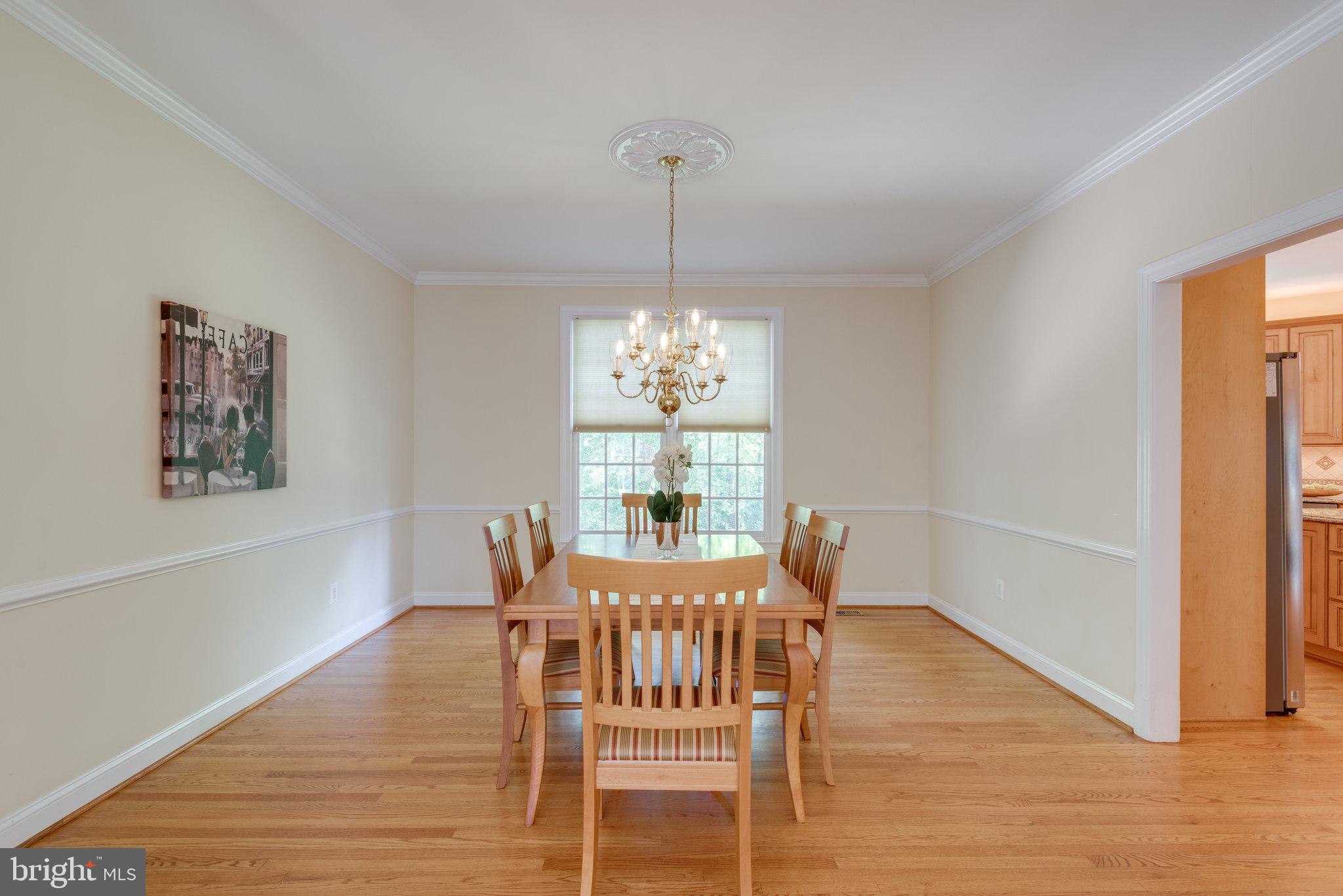 12104 North Walnut Branch Road Reston, VA 20194 - Photo 13 of 70 Dining Room has crown molding and chair rail
