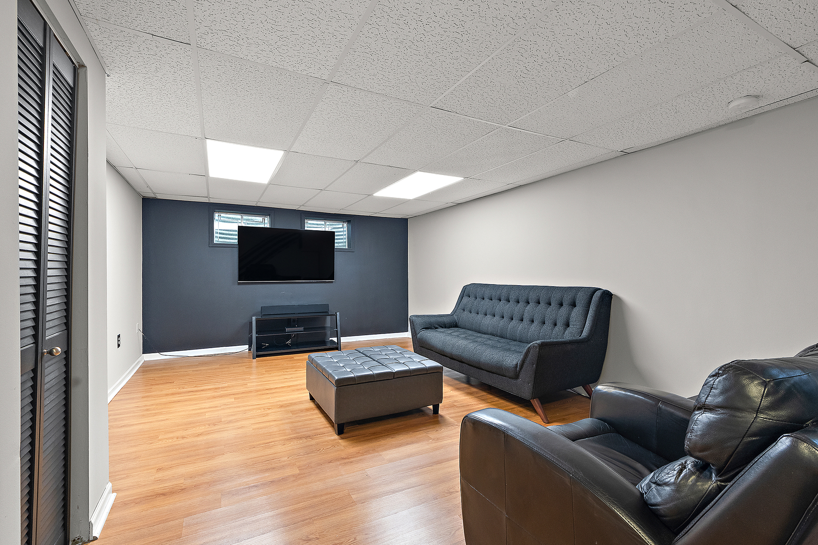806 Wescott Road Bolingbrook, IL 60440 - Photo 20 of 28 a living room with furniture and a flat screen tv