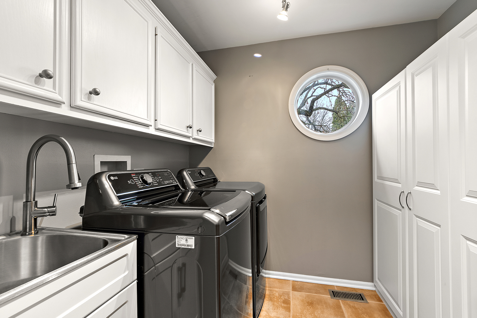 806 Wescott Road Bolingbrook, IL 60440 - Photo 21 of 28 a kitchen with a stove and a sink