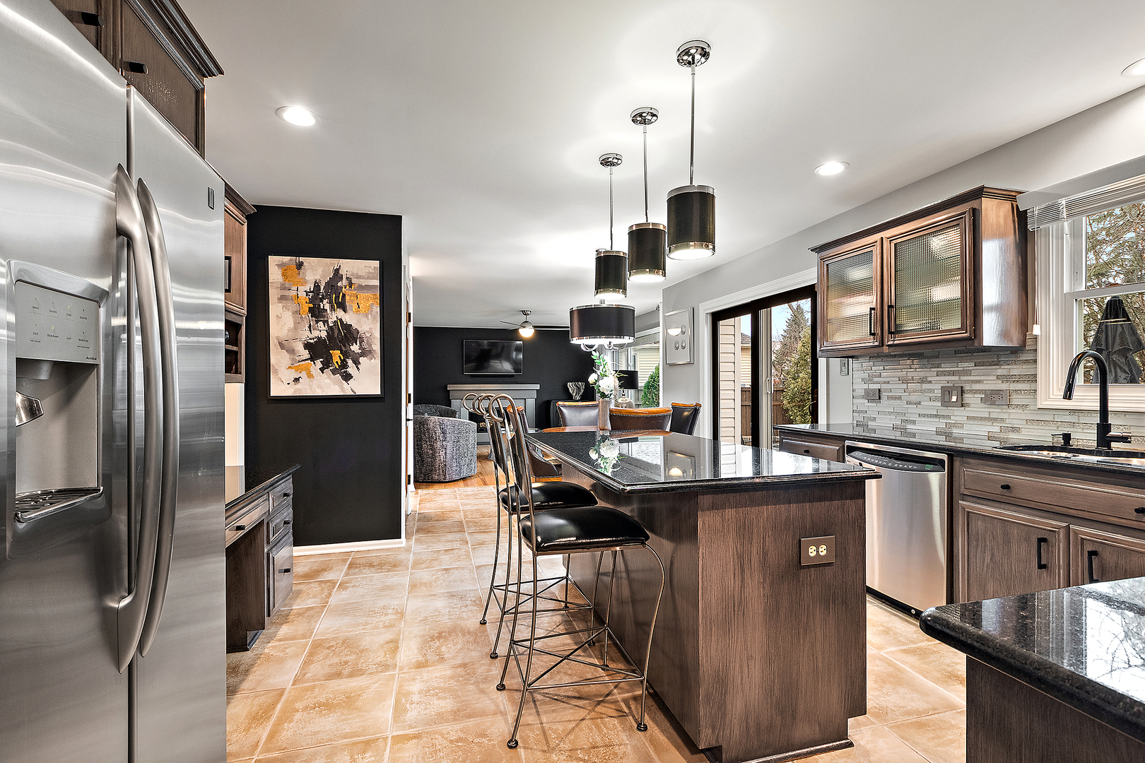 806 Wescott Road Bolingbrook, IL 60440 - Photo 4 of 28 a kitchen with stainless steel appliances granite countertop a sink a stove and refrigerator