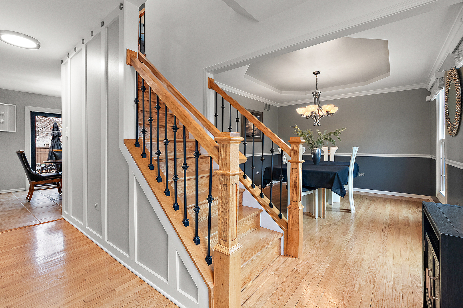 806 Wescott Road Bolingbrook, IL 60440 - Photo 9 of 28 a view of a livingroom with dining room and wooden floor