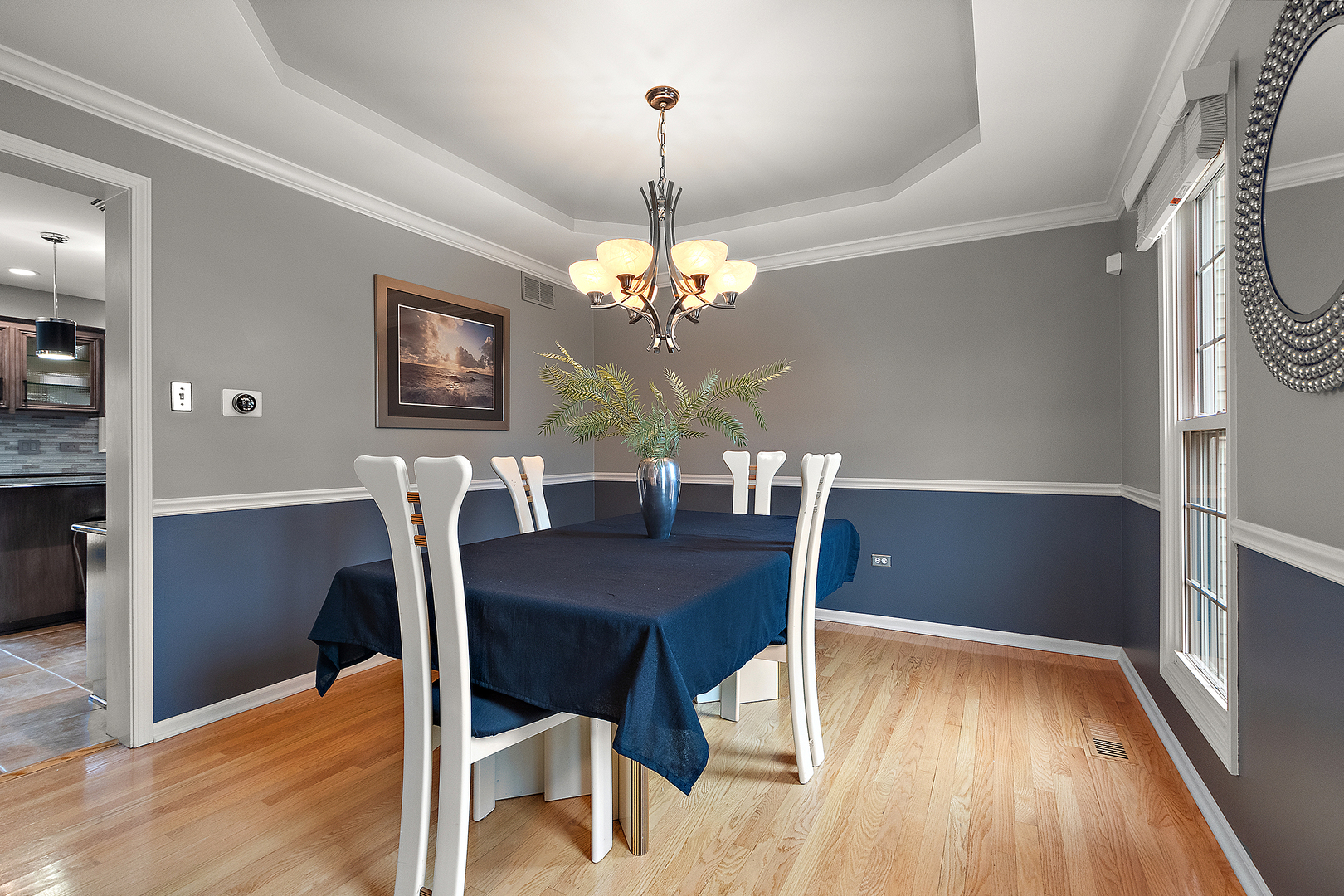 806 Wescott Road Bolingbrook, IL 60440 - Photo 10 of 28 a view of a dining room with furniture window and wooden floor