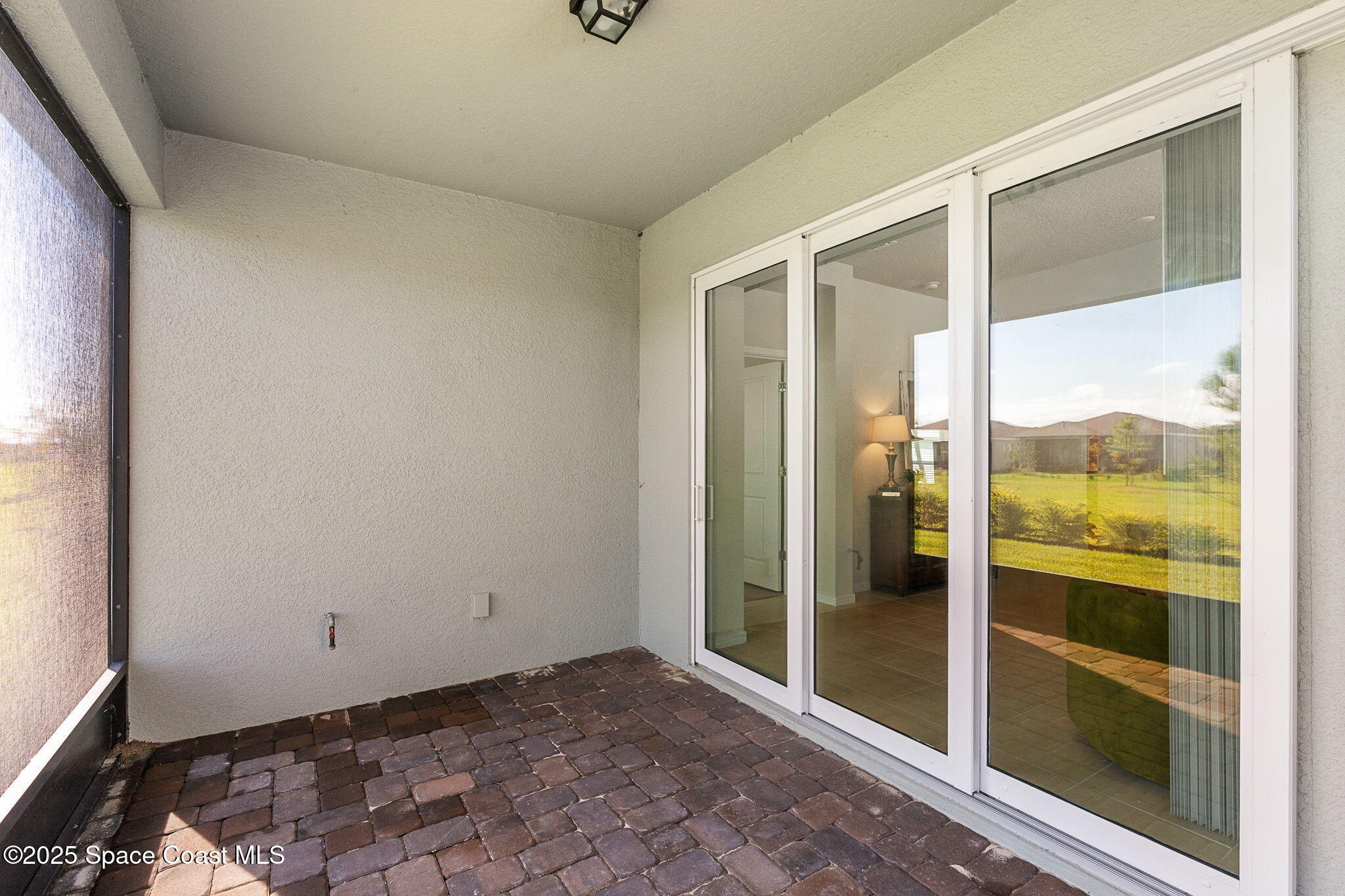 3013 Tidepool Place Melbourne, FL 32940 - Photo 28 of 52 Triple Sliding Glass Doors