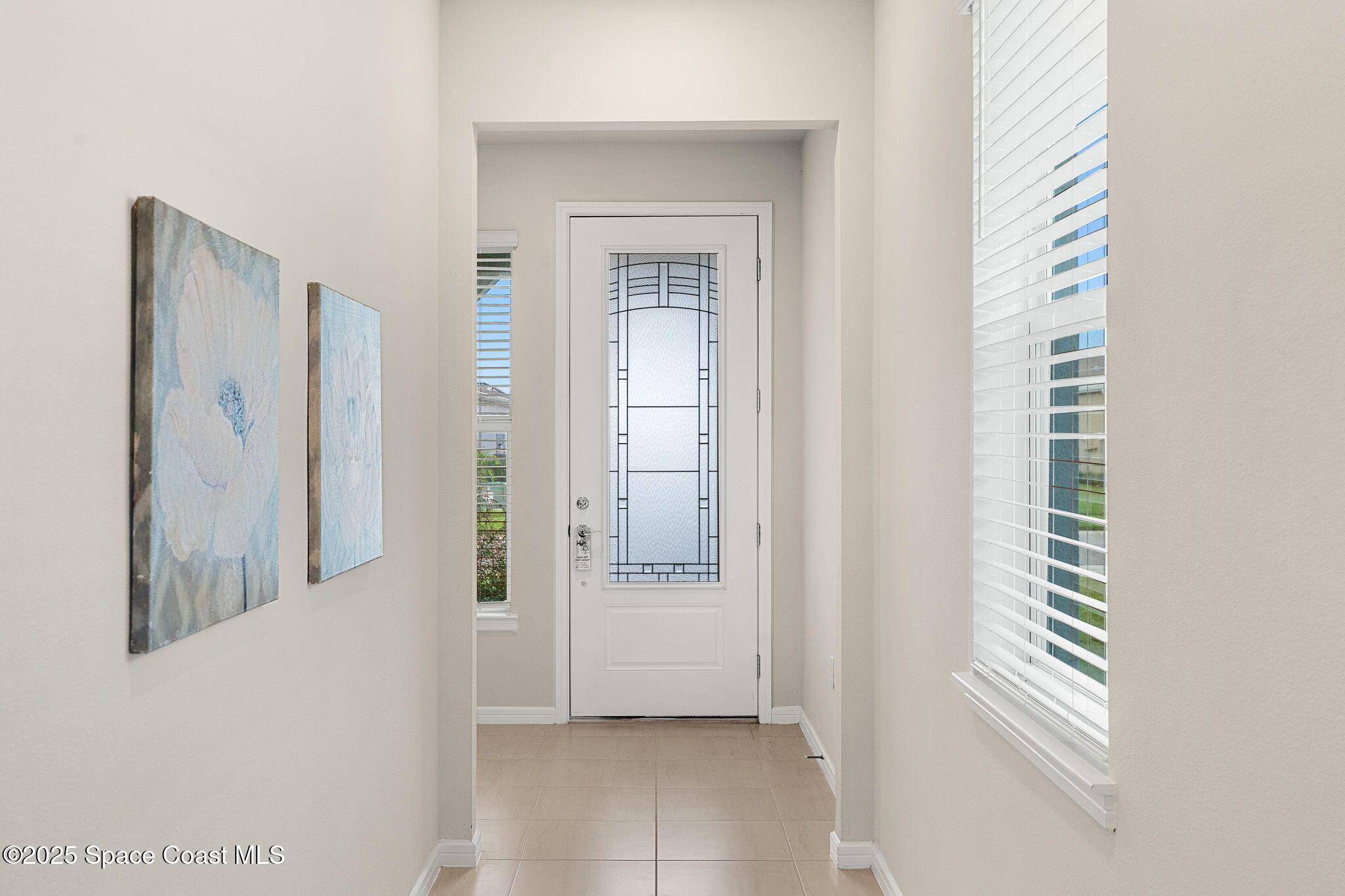 3013 Tidepool Place Melbourne, FL 32940 - Photo 4 of 52 Front Entry Hallway
