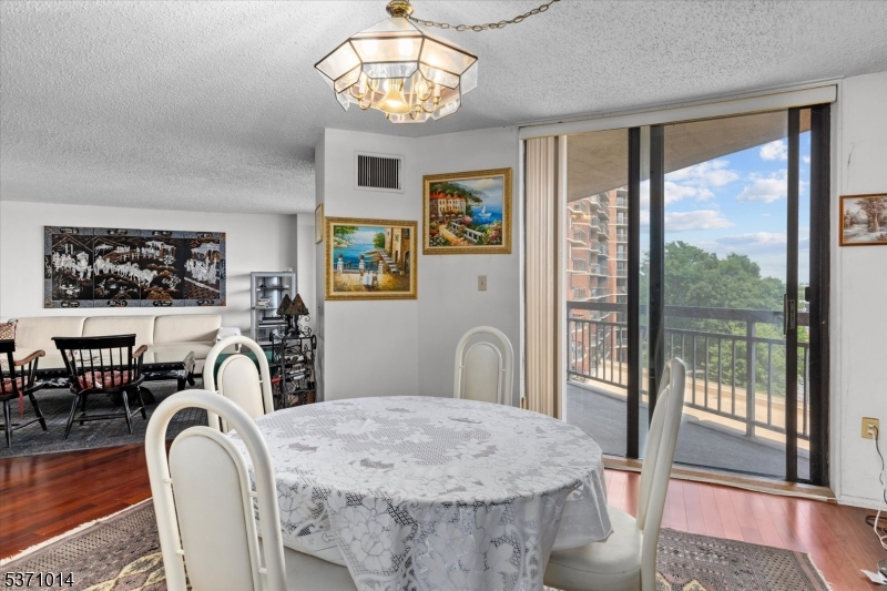 401 Harmon Cove Tower Secaucus, NJ 07094 - Photo 14 of 47 a view of a dining room with furniture window and outside view