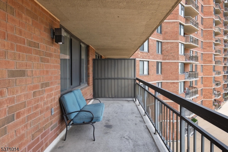 401 Harmon Cove Tower Secaucus, NJ 07094 - Photo 15 of 47 a view of a balcony with furniture