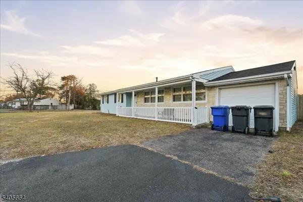 a view of house with outdoor space