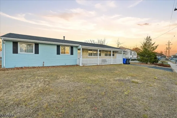 a front view of house with yard