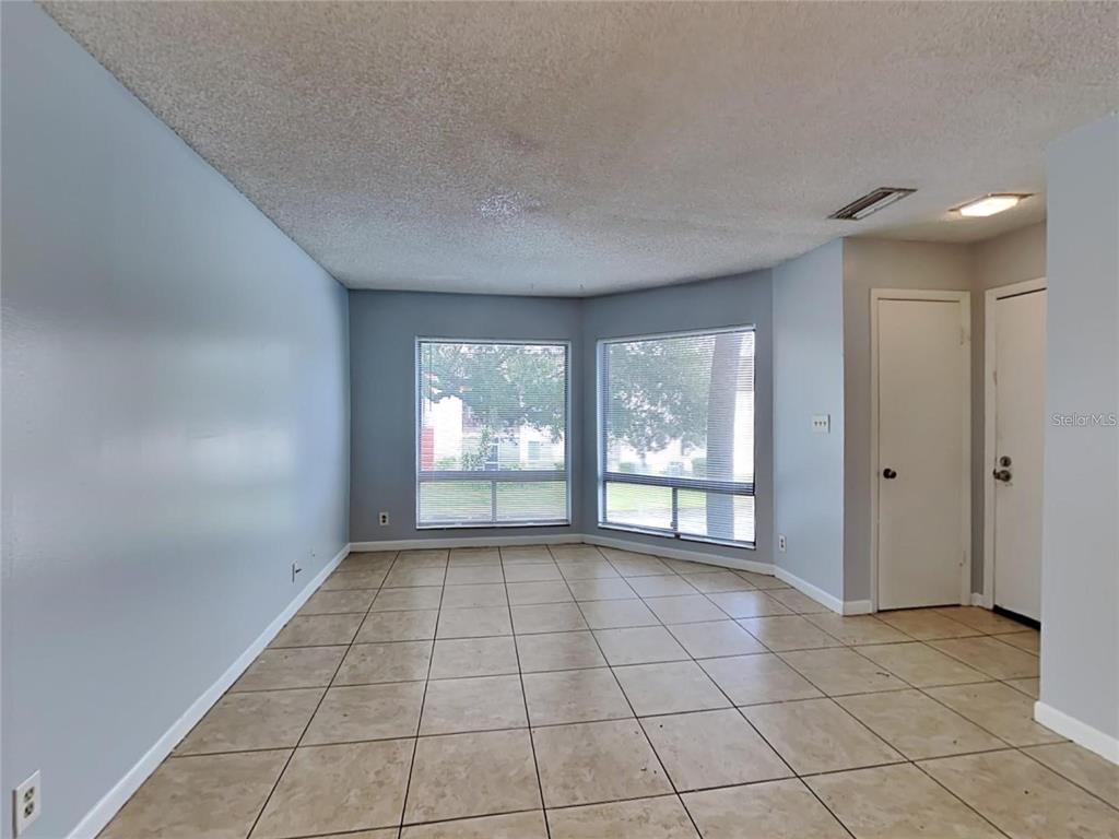 2546 Lemon Tree Lane, Unit G Orlando, FL 32839 - Photo 21 of 28 a view of an empty room and window
