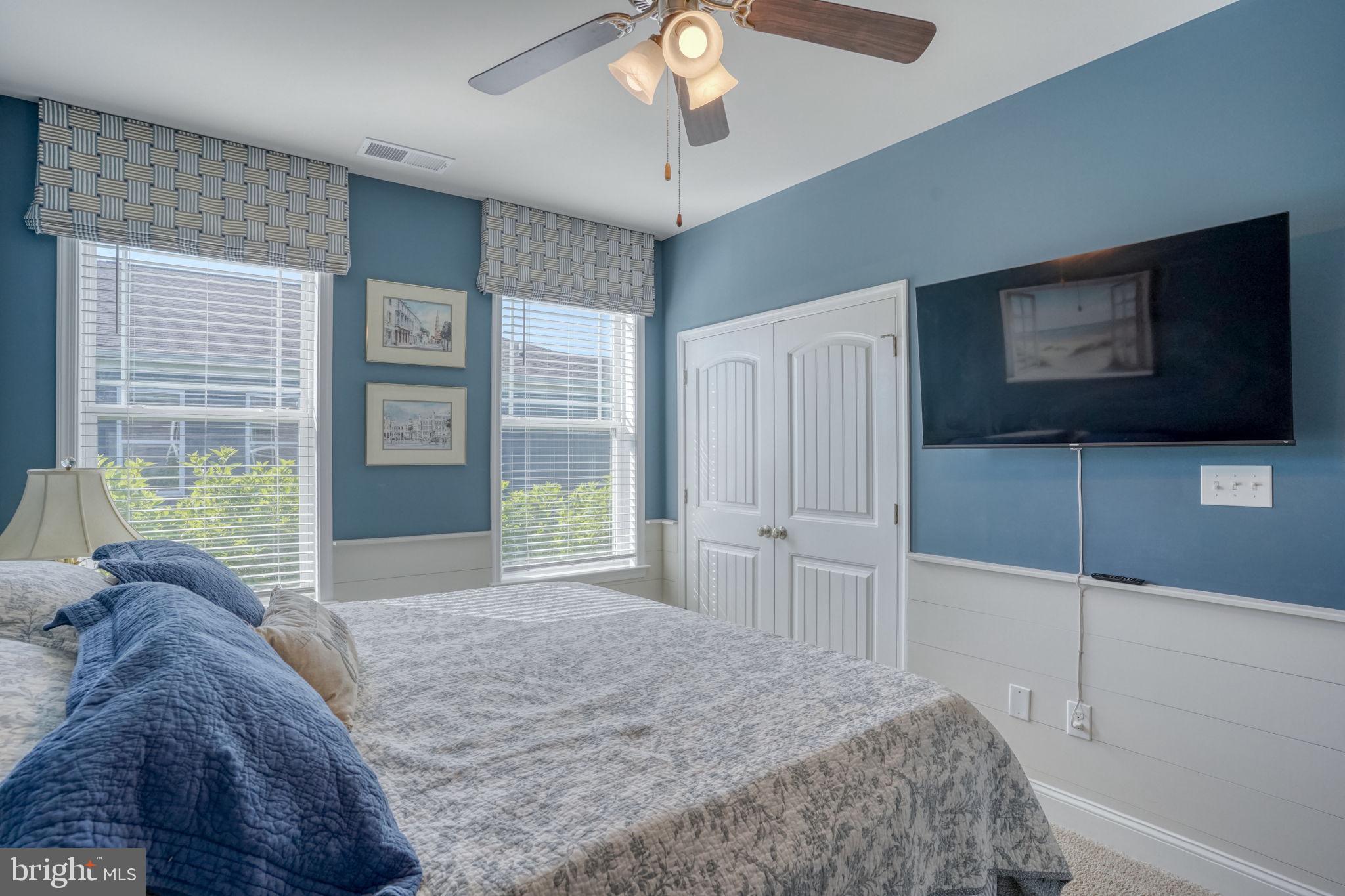 15272 Crape Myrtle Road Milton, DE 19968 - Photo 28 of 61 Serene blue-hued bedroom retreat.