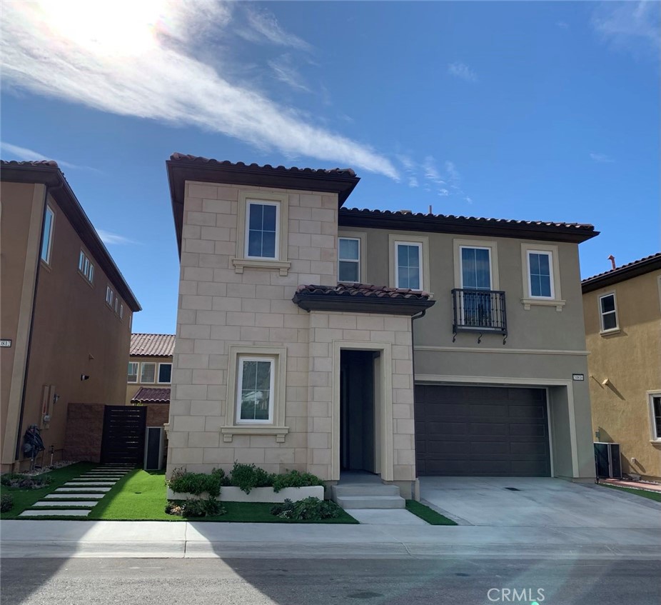 20816 Pine Cone Circle Porter Ranch, CA 91326 - Photo 1 of 1 a front view of a house with yard