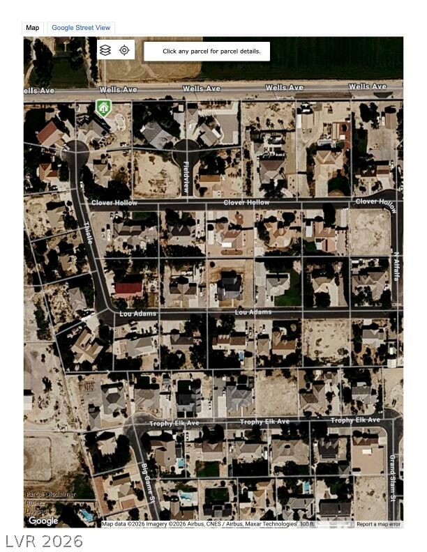 4362 Thistle Street Logandale, NV 89021 - Photo 98 of 99 An aerial view revealing a structured residential layout with distinct street patterns and individual properties.